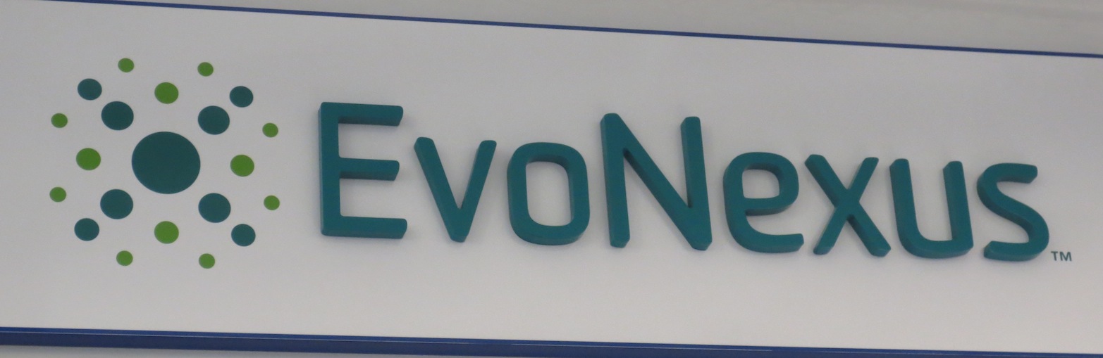 EvoNexus logo on their wall of their incubator space