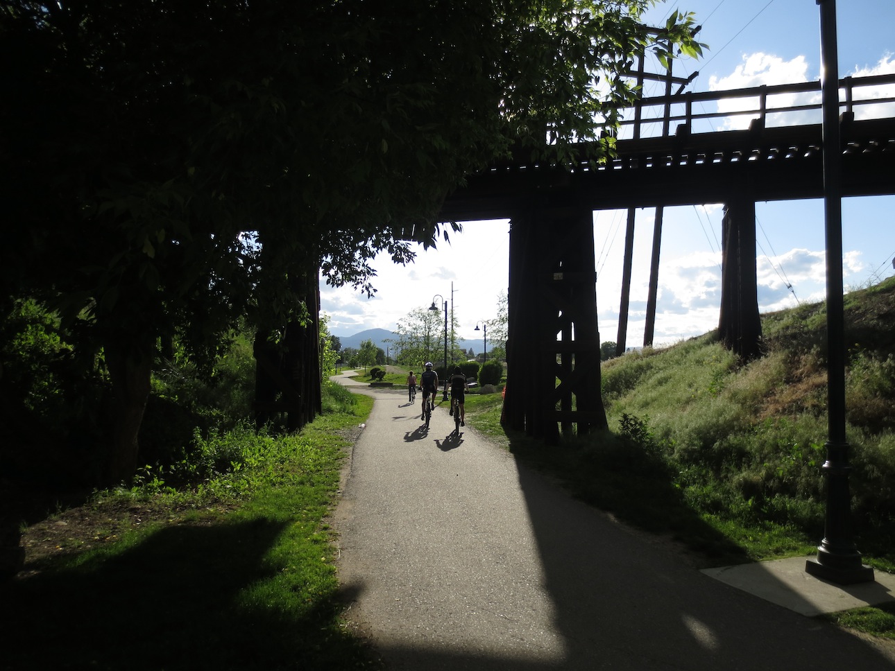 People riding bikes on the Missoula trail system.