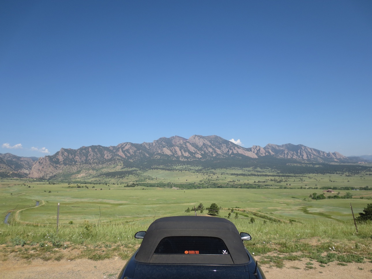 S2000 in near-ground with mountains in the background.