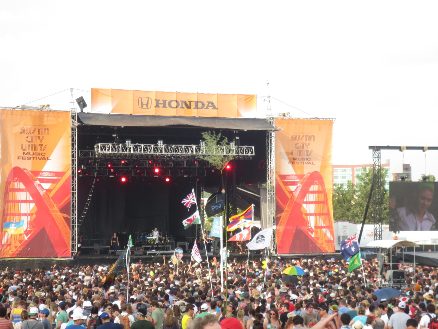 Grimes playing on stage.