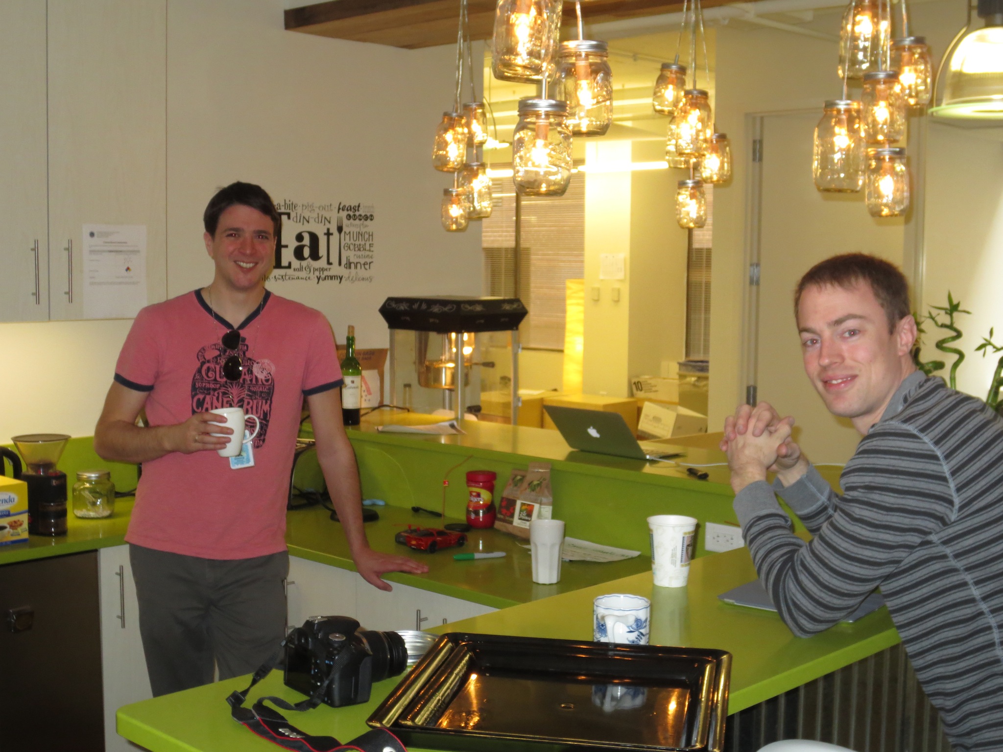 Josh and Ryan in the kitchen area of SocialCode's office