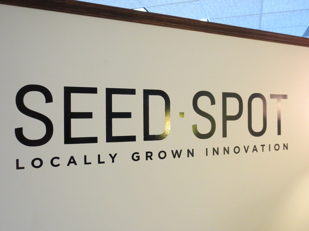 Seed Spot logo on their office entrance wall.