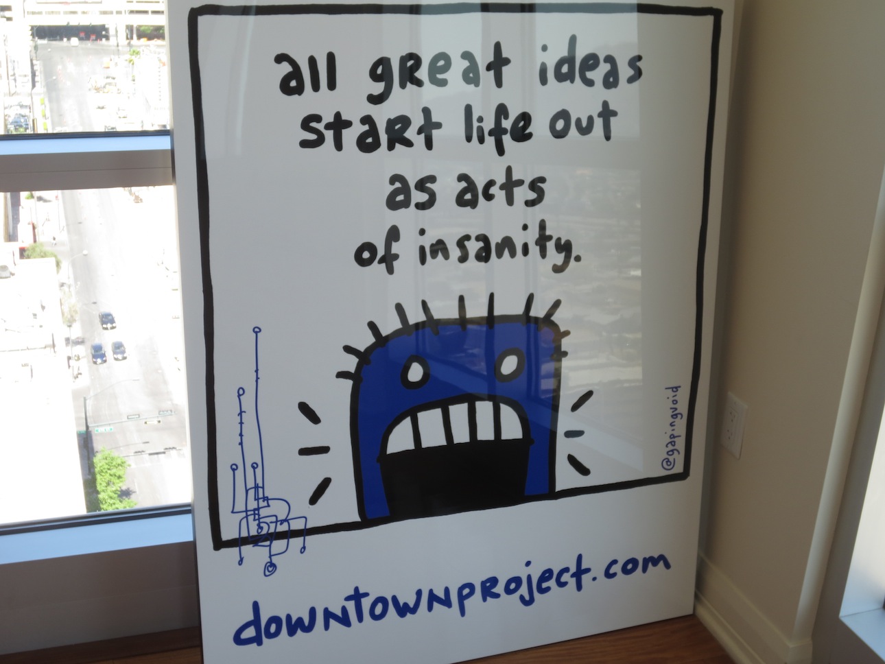 Insanity poster in Tony Hsieh's apartment.