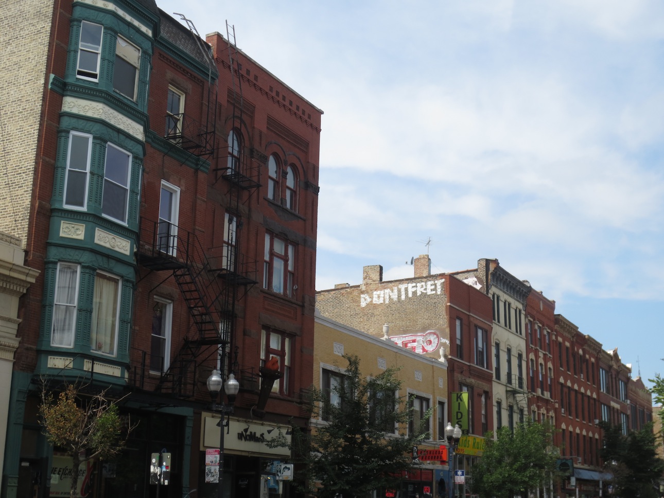 A view of three buildings in Wicker Park.